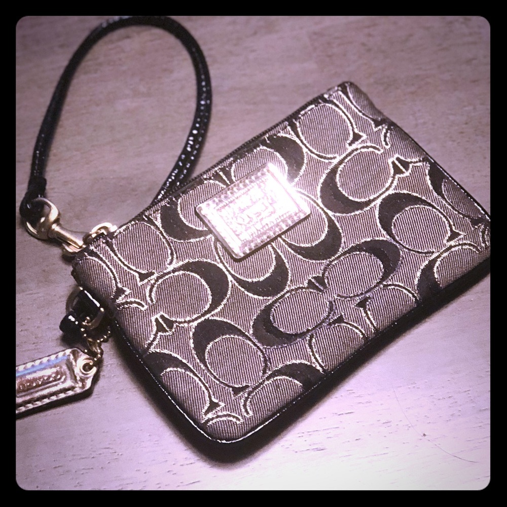 Coach logo pattern wristlet